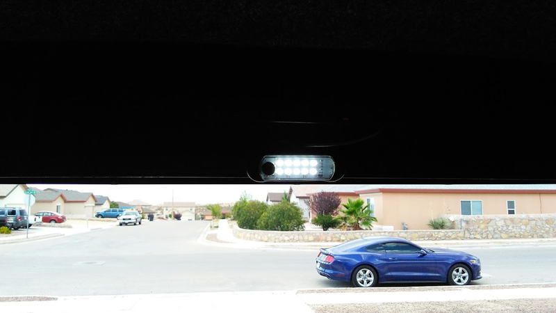 12V LED light, wired to the battery with an inline fuse. Also, the other Ford product in the household in the background